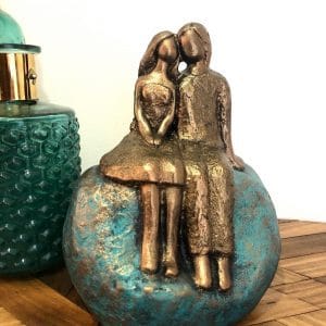 Pareja de enamorados turquesa y dorado